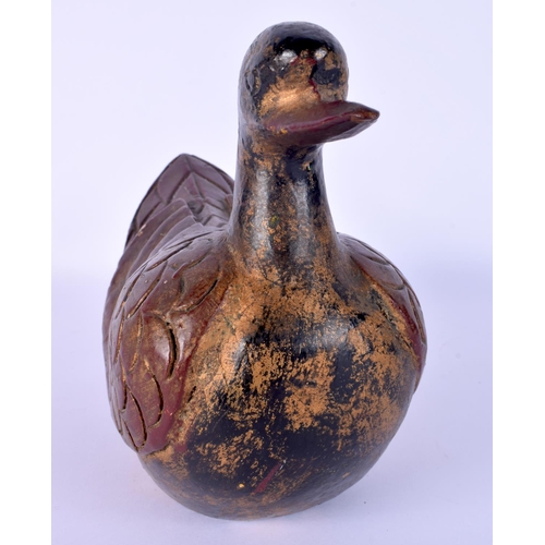56 - A RARE CHINESE QING DYNASTY LACQUERED WOOD FIGURE OF A DUCK of naturalistic form. 20 cm x 18 cm.