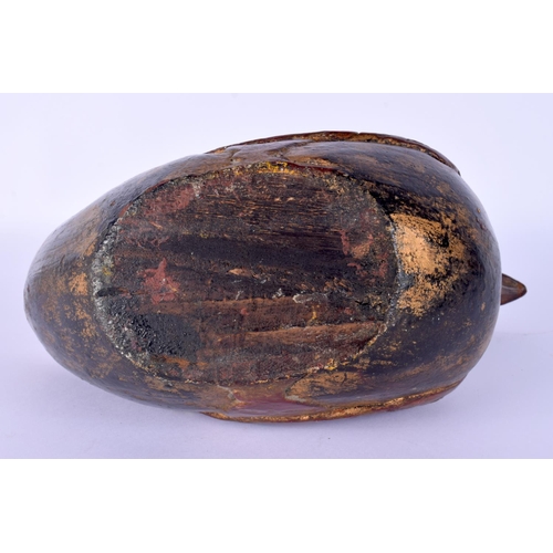 56 - A RARE CHINESE QING DYNASTY LACQUERED WOOD FIGURE OF A DUCK of naturalistic form. 20 cm x 18 cm.
