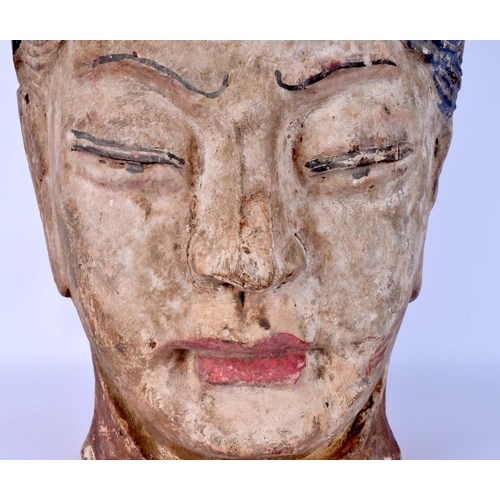 58 - A LARGE 19TH CENTURY CHINESE CARVED POLYCHROMED WOOD BUST OF GUANYIN modelled wearing a tiger mask. ... 