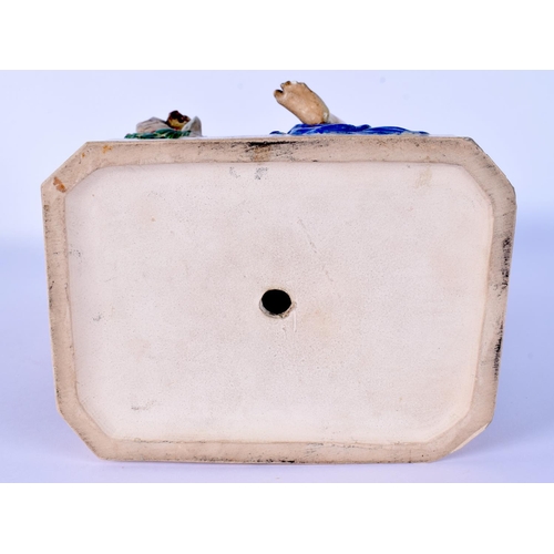 59 - A LARGE CHARLES VYSE FIGURE OF PAN AND A FEMALE modelled riding upon clashing rams. 24 cm x 17 cm.