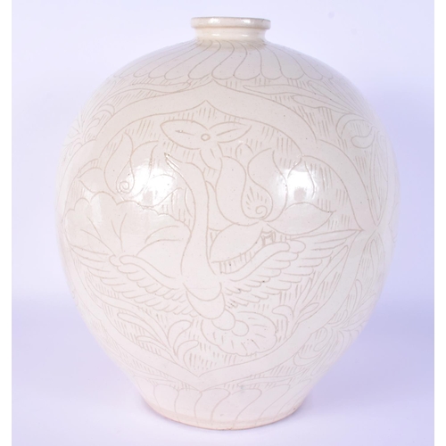 7 - A RARE CHINESE QING DYNASTY INCISED WHITE GLAZED BULBOUS VASE decorated with birds and foliage. 24 c... 