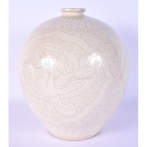 7 - A RARE CHINESE QING DYNASTY INCISED WHITE GLAZED BULBOUS VASE decorated with birds and foliage. 24 c... 