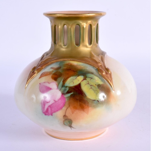 100 - Royal Worcester vase with pierced neck painted with roses shape H306 date mark 1916. 10cm high