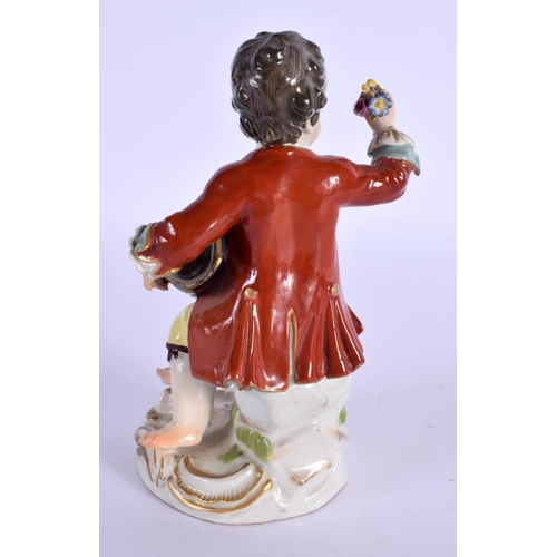 11 - A 19TH CENTURY MEISSEN PORCELAIN FIGURE OF A BOY modelled holding foliage. 13.5 cm x 6 cm.