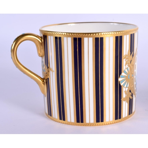 120 - Lynton Porcelain (Derby) 'jewelled' coffee can and saucer by Stefan Nowacki, signed,: painted with a... 