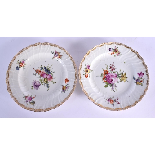 127 - Early 19th c. pair of Berlin plates with ozier moulded border painted with flowers,  sceptre mark in... 