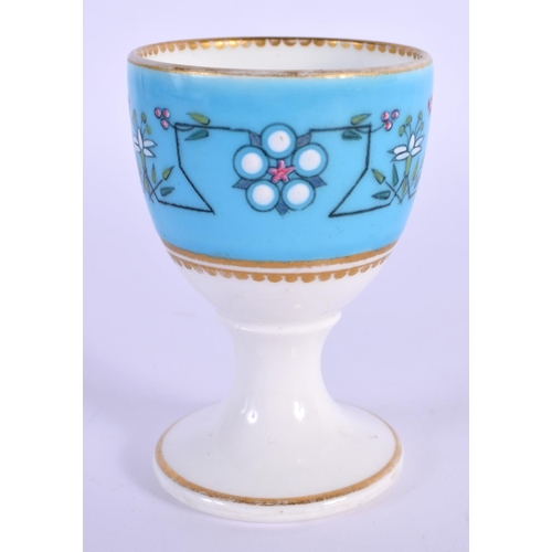 149 - Royal Worcester rare egg cup designed in the style of Sir Christopher Dresser with a turquoise groun... 