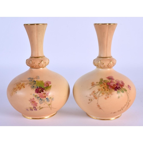 156 - Royal Worcester pair of vases painted with flowers on a blush ivory ground shape 799/G, on gilding b... 