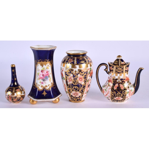 160 - Royal Crown Derby miniature coffee pot and cover pattern 6299, date mark 1912, a similar miniature b... 