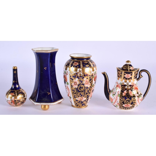 160 - Royal Crown Derby miniature coffee pot and cover pattern 6299, date mark 1912, a similar miniature b... 