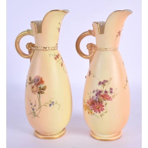 189 - Royal Worcester ewer painted with flowers on a blush ivory ground, shape 1065 date code for 1895 and... 