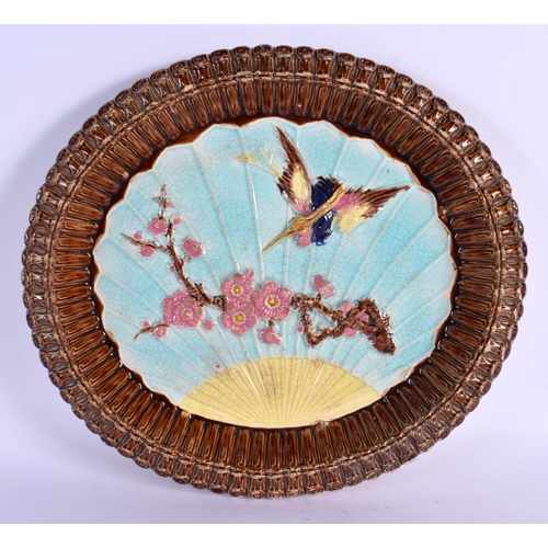 19 - A VICTORIAN MAJOLICA POTTERY DISH formed in the Aesthetic Movement taste. 30 cm x 15 cm.