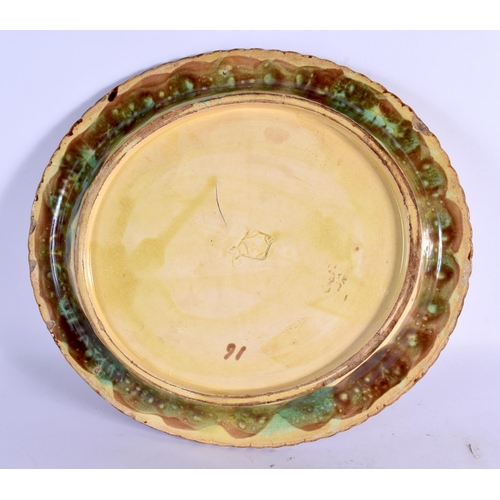 19 - A VICTORIAN MAJOLICA POTTERY DISH formed in the Aesthetic Movement taste. 30 cm x 15 cm.