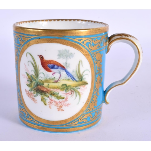 199 - 18th c. Sevres blue celeste mug, painted with two oval landscapes, both containing birds in a tooled... 