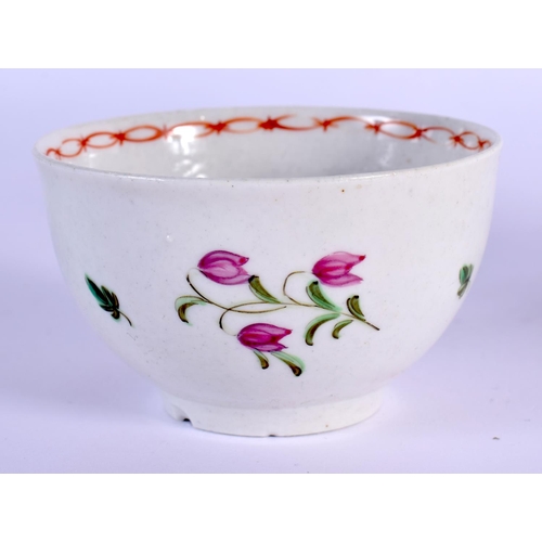 223 - Bristol teabowl and saucer painted with flowers under a red chainlink border