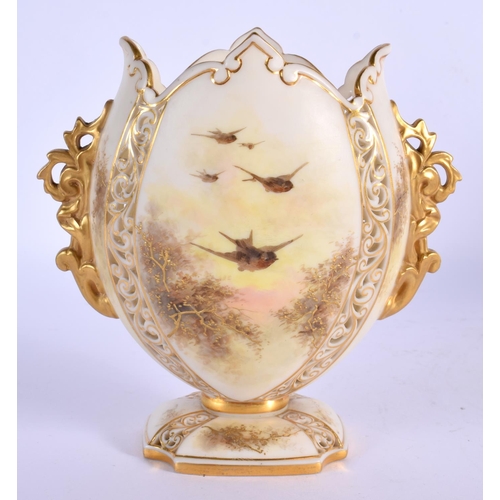 227 - Early 20th c. Graingers two handled vase painted with robins and gilt tree branches, the body with r... 