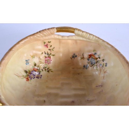 26 - A RARE ROYAL WORCESTER TWIN HANDLED BLUSH IVORY BASKET painted with flowers. 22 cm x 18 cm.