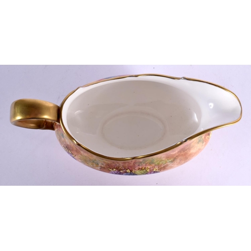 265 - Ex-Royal Worcester artist Frank Higgins sauceboat painted with fruit, signed, late 20th c. 19cm wide... 