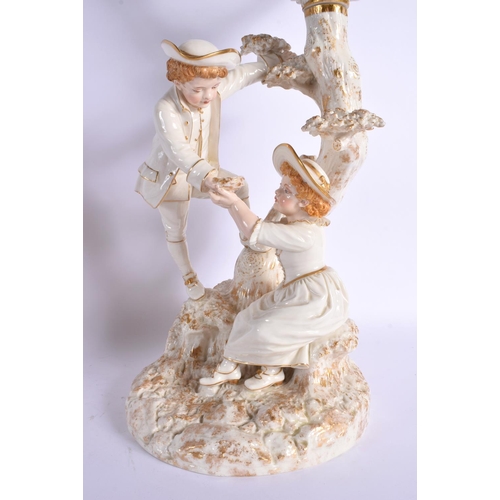 272 - Royal Worcester pair of candelabra after models by James Hadley of a boy and girl collecting birds e... 