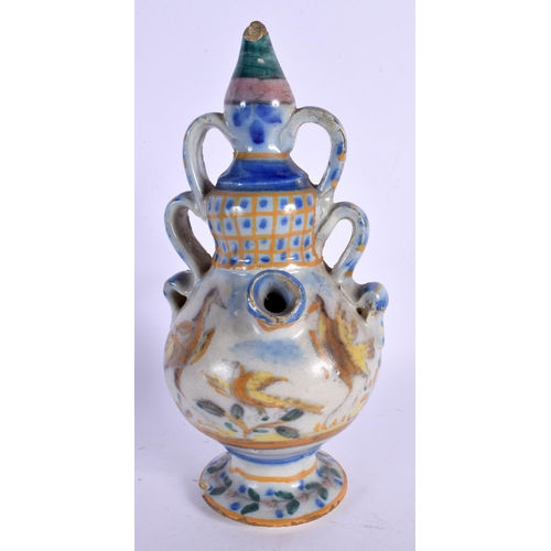 28 - AN 18TH CENTURY EUROPEAN FAIENCE GLAZED PUZZLE TYPE JUG painted with birds. 21 cm high.