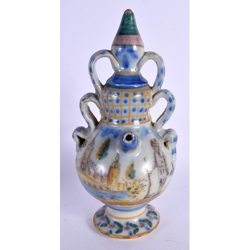 28 - AN 18TH CENTURY EUROPEAN FAIENCE GLAZED PUZZLE TYPE JUG painted with birds. 21 cm high.