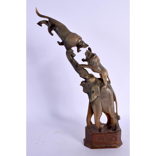 280 - A LARGE 19TH CENTURY ANGLO INDIAN CARVED RHINOCEROS HORN ELEPHANT GROUP modelled being attacked by t... 