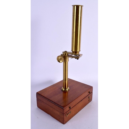 281 - A RARE ANTIQUE BRASS FIELD MICROSCOPE within a fitted case. 14 cm x 9 cm.