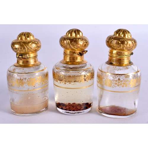 288 - A RARE 19TH CENTURY EUROPEAN GILT METAL LEATHER PERFUME SET with glass bottles. 21 cm x 11 cm.