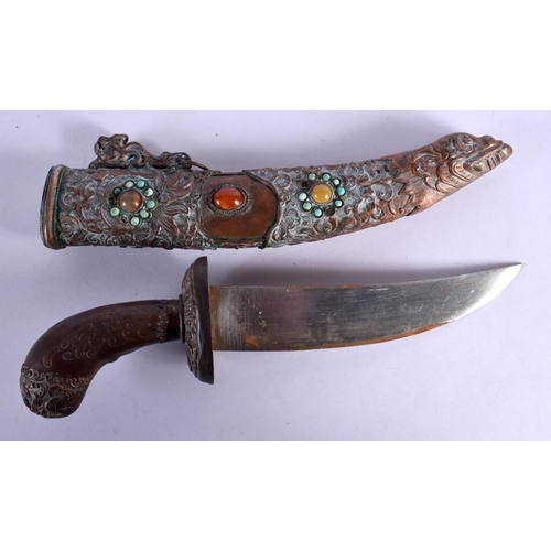 289 - AN ANTIQUE TIBETAN MIXED METAL DAGGER inset with stones. 31 cm long.