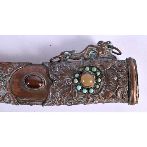 289 - AN ANTIQUE TIBETAN MIXED METAL DAGGER inset with stones. 31 cm long.