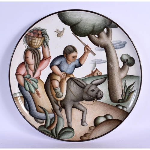 29 - A STYLISH VINTAGE SANTO STEFANO CERAMIC PLATE painted with a child upon a bull. 32 cm diameter.