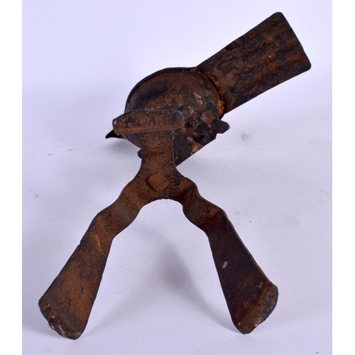 293 - AN EARLY CONTINENTAL SHEET METAL BIRD OIL LAMP. 25 cm high.