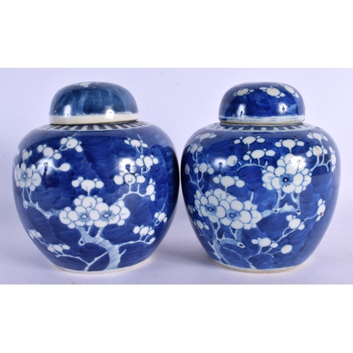 300 - A MATCHED PAIR OF 19TH CENTURY CHINESE BLUE AND WHITE GINGER JARS Kangxi style. 15 cm x 11 cm.