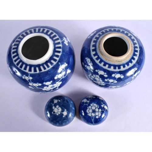 300 - A MATCHED PAIR OF 19TH CENTURY CHINESE BLUE AND WHITE GINGER JARS Kangxi style. 15 cm x 11 cm.