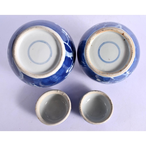 300 - A MATCHED PAIR OF 19TH CENTURY CHINESE BLUE AND WHITE GINGER JARS Kangxi style. 15 cm x 11 cm.