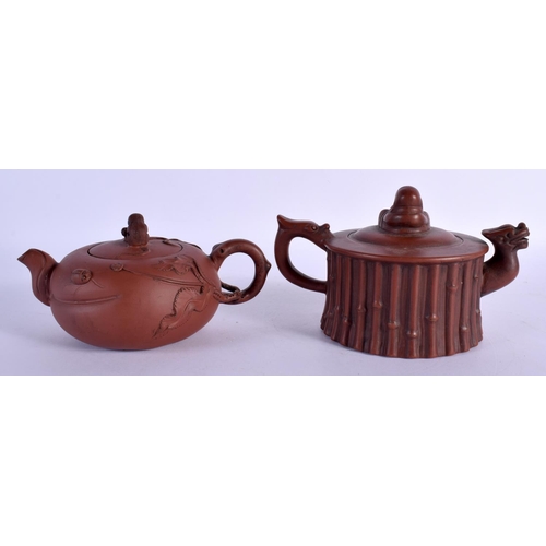 304 - TWO EARLY 20TH CENTURY CHINESE YIXING POTTERY TEAPOTS AND COVERS Late Qing/Republic. Largest 16 cm w... 