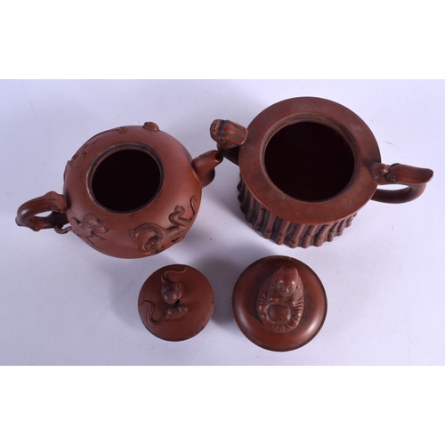 304 - TWO EARLY 20TH CENTURY CHINESE YIXING POTTERY TEAPOTS AND COVERS Late Qing/Republic. Largest 16 cm w... 