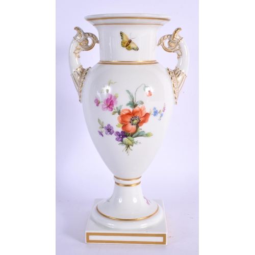 31 - A FINE KPM BERLIN TWIN HANDLED PORCELAIN VASE painted with flowers and insects. 21 cm high.