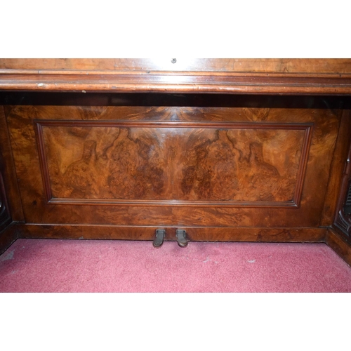 312 - A FINE ANTIQUE BURR WALNUT VOGEL PIANO with brass candle sconces. Note: The piano is kept off site, ... 