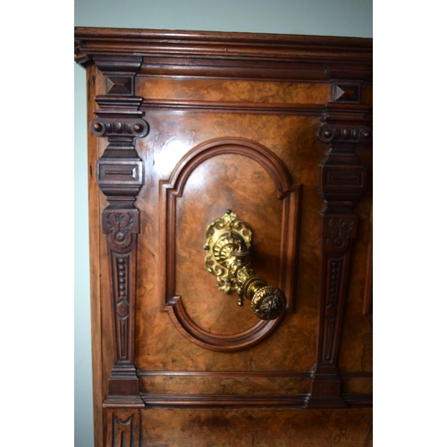 312 - A FINE ANTIQUE BURR WALNUT VOGEL PIANO with brass candle sconces. Note: The piano is kept off site, ... 