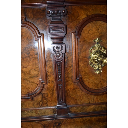 312 - A FINE ANTIQUE BURR WALNUT VOGEL PIANO with brass candle sconces. Note: The piano is kept off site, ... 