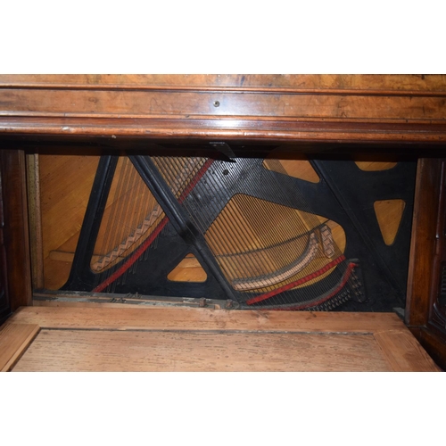 312 - A FINE ANTIQUE BURR WALNUT VOGEL PIANO with brass candle sconces. Note: The piano is kept off site, ... 