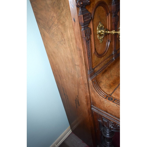 312 - A FINE ANTIQUE BURR WALNUT VOGEL PIANO with brass candle sconces. Note: The piano is kept off site, ... 