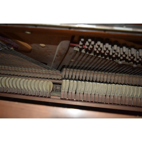 312 - A FINE ANTIQUE BURR WALNUT VOGEL PIANO with brass candle sconces. Note: The piano is kept off site, ... 