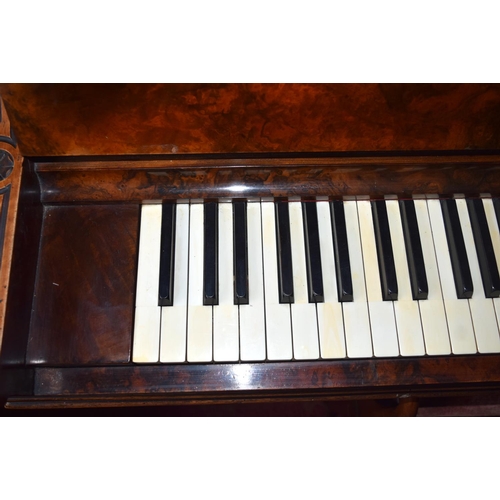 312 - A FINE ANTIQUE BURR WALNUT VOGEL PIANO with brass candle sconces. Note: The piano is kept off site, ... 