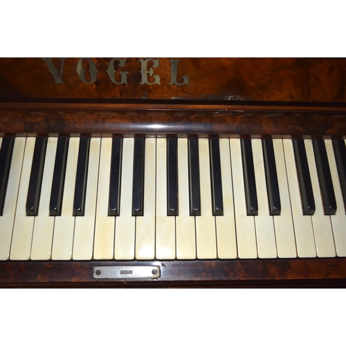 312 - A FINE ANTIQUE BURR WALNUT VOGEL PIANO with brass candle sconces. Note: The piano is kept off site, ... 