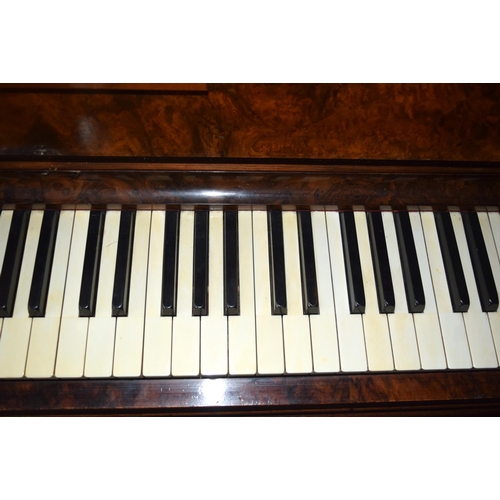 312 - A FINE ANTIQUE BURR WALNUT VOGEL PIANO with brass candle sconces. Note: The piano is kept off site, ... 