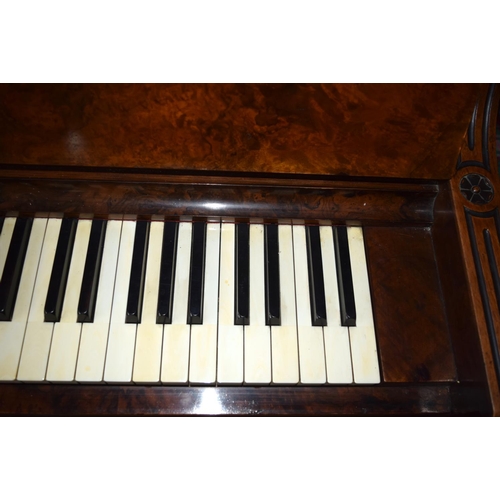 312 - A FINE ANTIQUE BURR WALNUT VOGEL PIANO with brass candle sconces. Note: The piano is kept off site, ... 