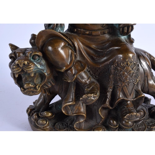 314 - A CHINESE BRONZE FIGURE OF A GUARDIAN 20th Century. 23 cm x 13 cm.