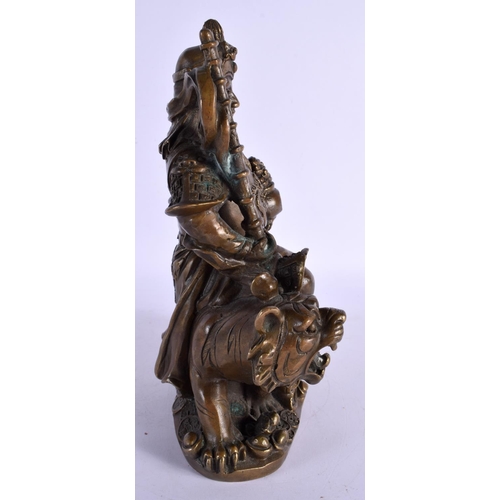 314 - A CHINESE BRONZE FIGURE OF A GUARDIAN 20th Century. 23 cm x 13 cm.